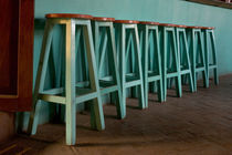 Green Bar Stools line wall inside Roof Top Cafe near the Iglesia de Santo Domingo and the city's historic Zocalo by Danita Delimont