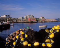 Fishing nets and houses by Danita Delimont