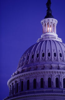 S Capitol at dusk with light in dome on showing that Congress is in session by Danita Delimont