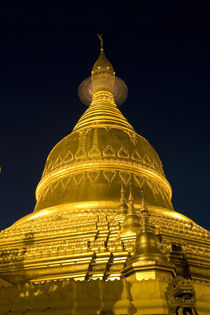 Buddhist temple in Yangon at night by Danita Delimont