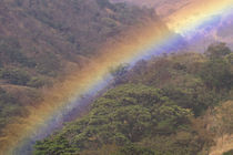 Rainbow over rural valley von Danita Delimont