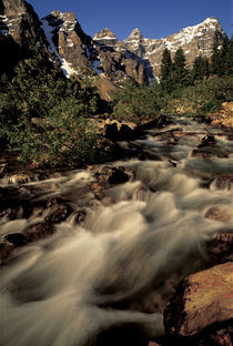 Meltwater rushes out of Morraine Lake by Danita Delimont