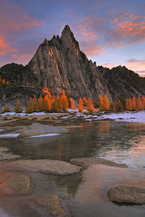 Prusik Peak from frozen Gnome Tarn in the Enchantment Lakes by Danita Delimont