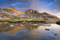 Storm clouds brewing over McHenry's Peak in Glacier Gorge by Danita Delimont