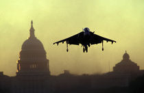 A Harrier jet landing on the Mall at dawn with the US Capitol in the background von Danita Delimont