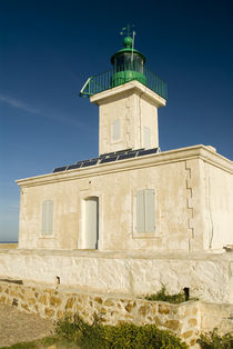 Lighthouse with solar panels short hike from town von Danita Delimont