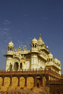 India A woman standing at and accient temple by Danita Delimont