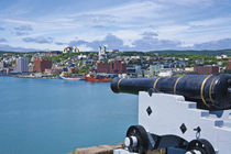 John's as seen from near a cannon at Fort Cabot on Signal Hill across the harbor von Danita Delimont