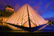 The Louvre museum at twilight by Danita Delimont