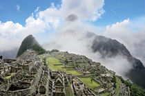The ancient lost city of the Inca shrouded in mist and clouds by Danita Delimont