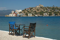 Kastellorizo: chairs on the edge of Kastellorizo harbour von Danita Delimont