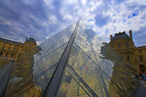 Clouds reflect off the Louvre Museum by Danita Delimont