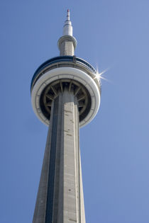 Top of CN Tower with sun star burst reflected on the top disc von Danita Delimont