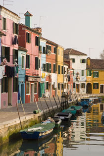 Colorful houses of line a canal by Danita Delimont
