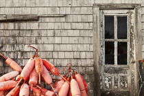 Coastal shanty and buoys, Maine, USA