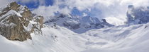 Snowy mountains and valley in winter by Sami Sarkis Photography