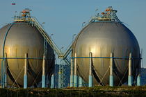 Oil tanks in petroleum refinery by Sami Sarkis Photography