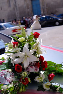 Wedding bouquet on car by Sami Sarkis Photography