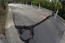 Cracks on countryside road after ground slippage  by Sami Sarkis Photography
