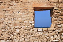 Wall with window framing blue seascape by Sami Sarkis Photography