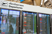 Departure board at airport by Sami Sarkis Photography