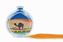 Camel drawni with sand inside a bottle von Sami Sarkis Photography