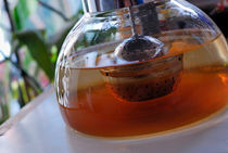Tea infusing in teapot by Sami Sarkis Photography