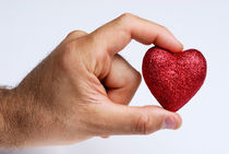 Man holding glittery heart von Sami Sarkis Photography