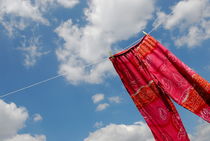 Pant hanging on washing line by Sami Sarkis Photography