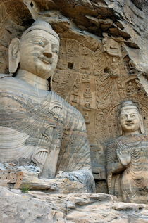 Giant Buddha statues in Yungang Shiku caves by Sami Sarkis Photography