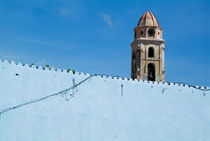 Bell tower of the Convent of San Francisco behind a blue wall by Sami Sarkis Photography