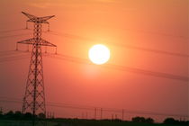 Electrical pylon at silhouetted at sunset von Sami Sarkis Photography