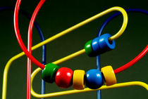 Colourful toy abacus with bright beads. von Sami Sarkis Photography