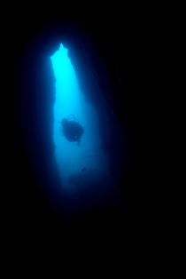 France marseille riou island imperial de terre a scuba diver swimming inside a underwater fault by Sami Sarkis Photography