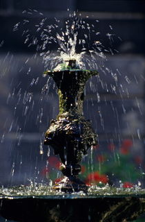 Splashing water on fountain by Sami Sarkis Photography