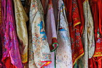 Row of hanged traditionnal vietnamese clothes by Sami Sarkis Photography