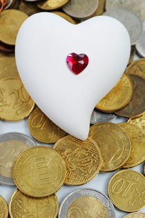 Heartshape on money by Sami Sarkis Photography