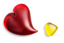 Red and yellow heart shapes made of glass by Sami Sarkis Photography