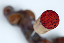 Red Wine cork on corkscrew by Sami Sarkis Photography