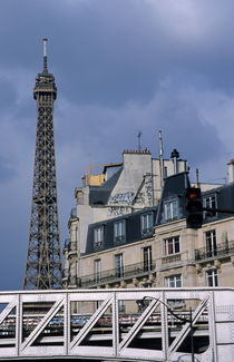  Eiffel Tower behind metro train bridge by Sami Sarkis Photography