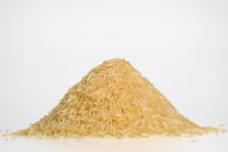 Rice stack on white background von Sami Sarkis Photography