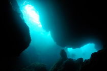 Scuba Divers exploring underwater caves by Sami Sarkis Photography