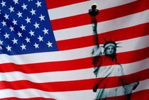 Statue of Liberty and US flag by Sami Sarkis Photography