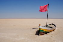 Abandoned rowboat in dry salt lake by Sami Sarkis Photography