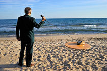 Businessman on beach with Landline Phone receiver von Sami Sarkis Photography
