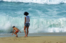 Mother and son playing on beach by Sami Sarkis Photography