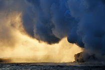 Steam rising off lava flowing into ocean at sunset by Sami Sarkis Photography