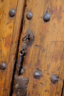 Wooden door and keyhole by Sami Sarkis Photography