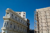 Colonial architecture next to a new building still under construction in Havana by Sami Sarkis Photography