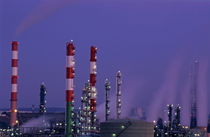 Petroleum refinery chimneys at dusk von Sami Sarkis Photography